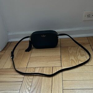 Black leather Kate Spade crossbody bag with gold hardware
